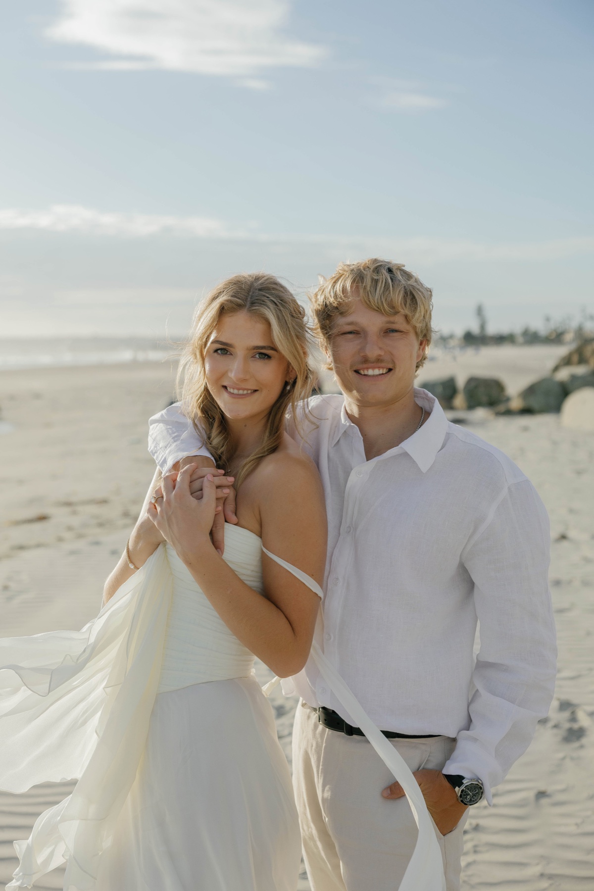 Jade and Patrick together on the beach