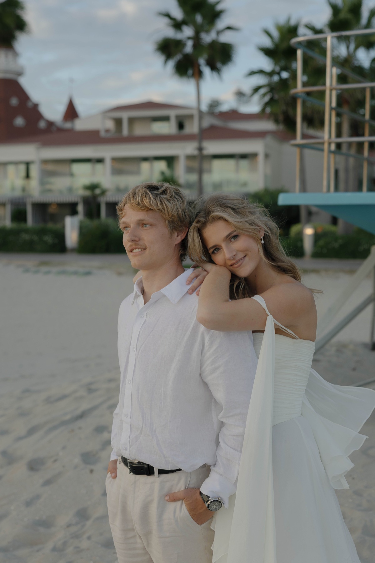 Jade and Patrick posing together on the beach